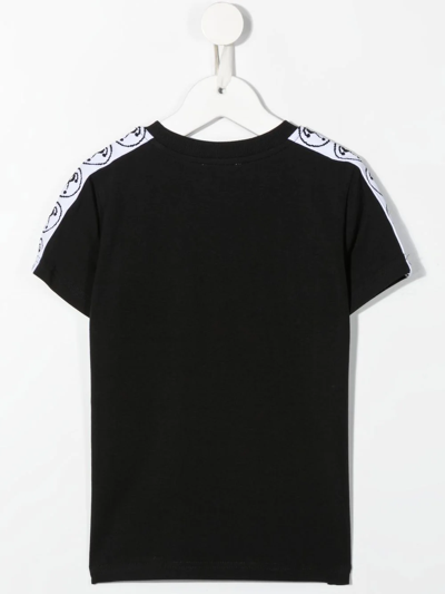Shop Moschino Logo-print Cotton T-shirt In Schwarz
