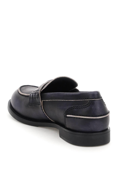 Shop Miu Miu Used-effect Leather Loafers In Black