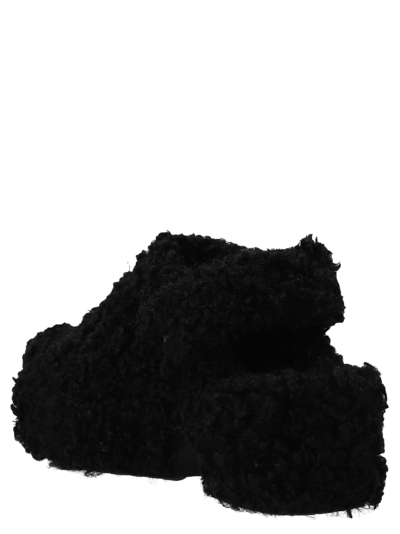 Shop Xocoi Eco Fur Clogs In Black