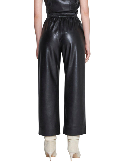 Shop Nanushka Elasticated Waistband Straight-leg Trousers In Black