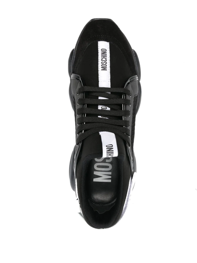 Shop Moschino Panelled Chunky Sneakers In Black