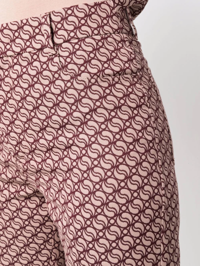 Shop Stella Mccartney Flared Monogram Trousers In Pink