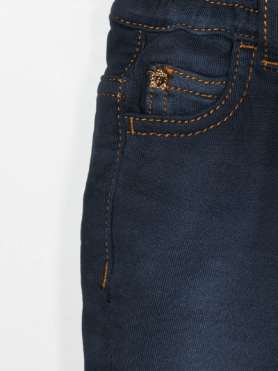 Shop Versace Logo-print Straight-leg Jeans In Blue