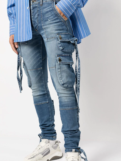 Shop Amiri Skinny Cargo Jeans In Blue
