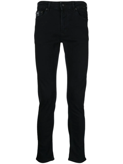 Shop Versace Jeans Couture Logo-print Skinny-fit Jeans In Black