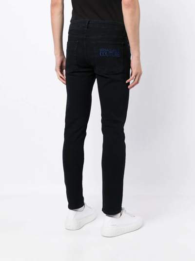 Shop Versace Jeans Couture Logo-print Skinny-fit Jeans In Black