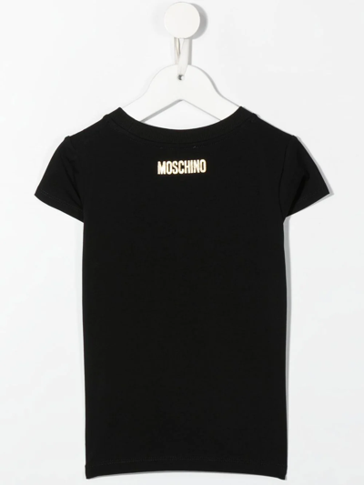 Shop Moschino Handle With Care T-shirt In Black