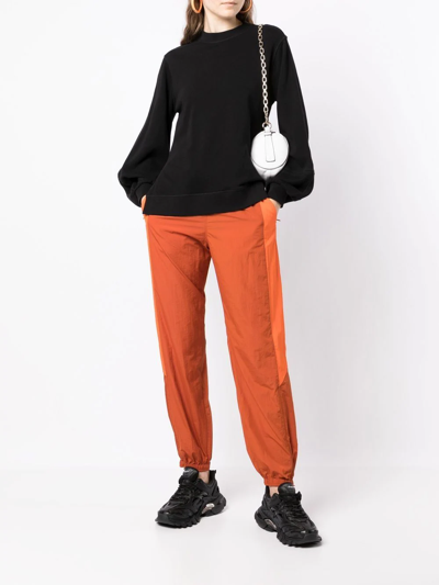 Y-3 Contrasting-panel Tracksuit Bottom In Orange