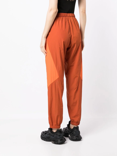 Shop Y-3 Contrasting-panel Tracksuit Bottom In Orange