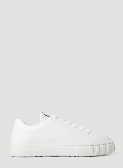 Shop Miu Miu Embossed Bumper Sneakers In White