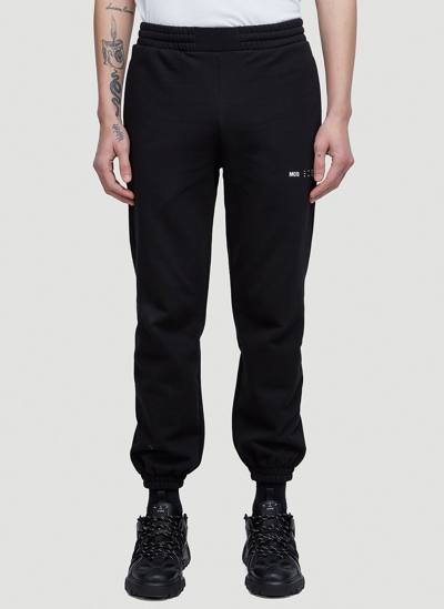 Shop Mcq By Alexander Mcqueen Logo Track Pants In Black