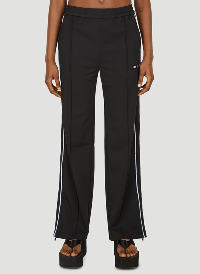Shop Mcq By Alexander Mcqueen Icon Logo Patch Track Pants In Black