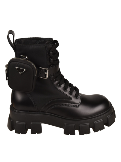 Shop Prada Strapped Pouch Combat Boots In Black