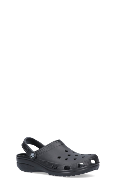 Shop Crocs Flat Shoes In Black