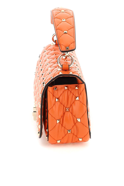 Shop Valentino Garavani Rockstud Spike Handbag In Orange