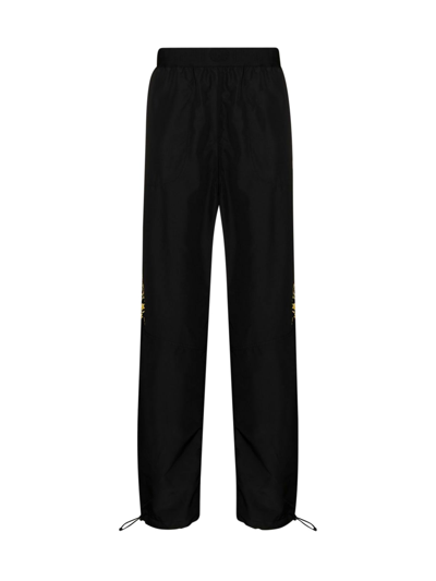 Shop Versace Pants Nylon Tasky Stampa Barocco + Nylon Tasky Unito Nero In Black