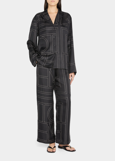 Shop Totême Monogram-embroidered Silk Pajama Pants In Black Monogram 92