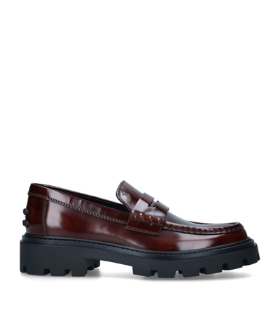 Shop Tod's Leather Gomma Pesante Loafers In Brown