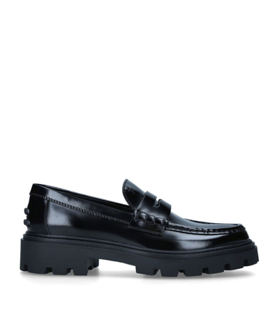 Shop Tod's Leather Gomma Pesante Loafers In Black