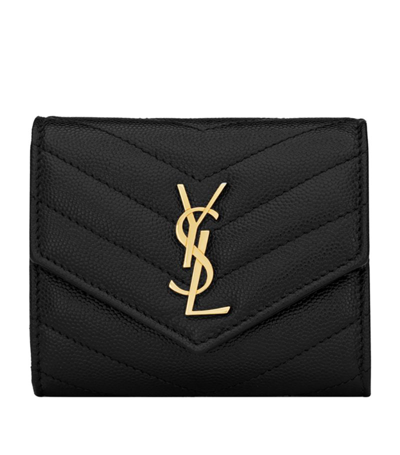 Shop Saint Laurent Leather Quilted Trifold Wallet In Black