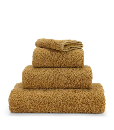 Shop Abyss & Habidecor Super Pile Bath Towel (70cm X 140cm) In Gold