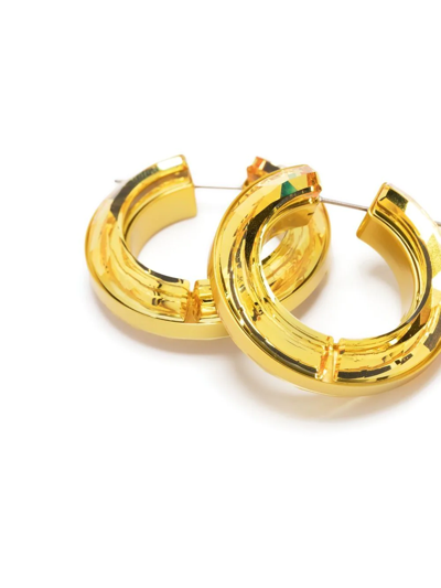 Shop Swarovski Lucent Chunky Hoop Earrings In Yellow