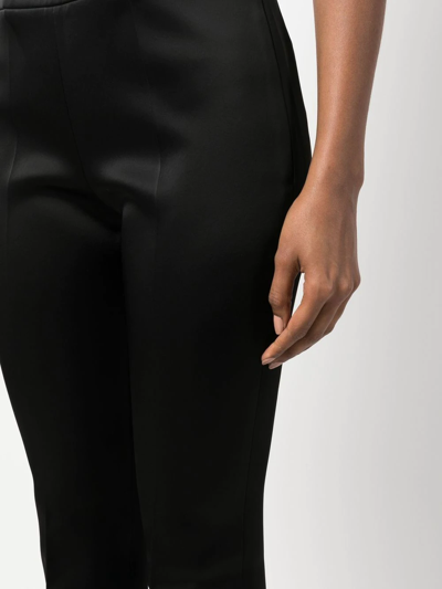 Givenchy Pressed-crease Mid-rise Flared Satin Trousers In Black