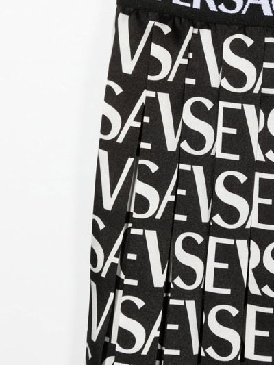 Shop Versace Logo-print Mini Skirt In Black