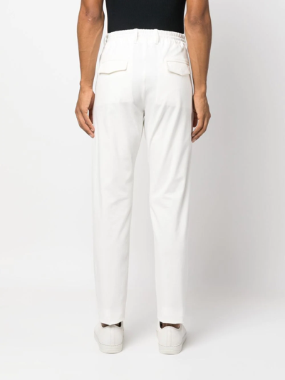 Shop Eleventy Drawstring-waist Tapered Trousers In White