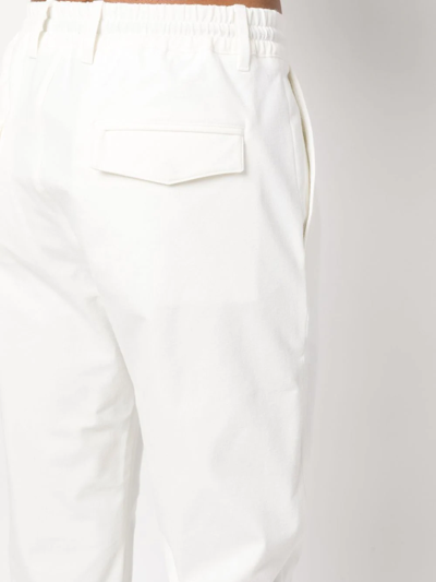 Shop Eleventy Drawstring-waist Tapered Trousers In White
