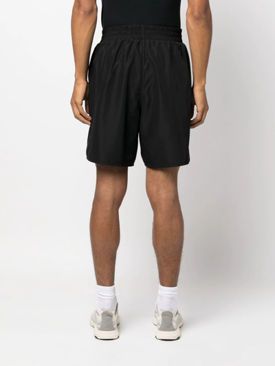 Shop Jil Sander Elasticated-waist Shorts In Black