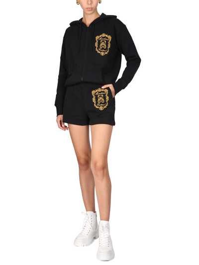 Shop Moschino Shorts With Logo In Nero