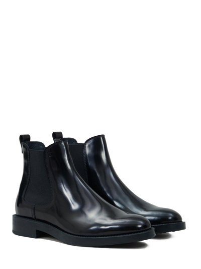 Shop Tod's Stamped Monogram Ankle Boots