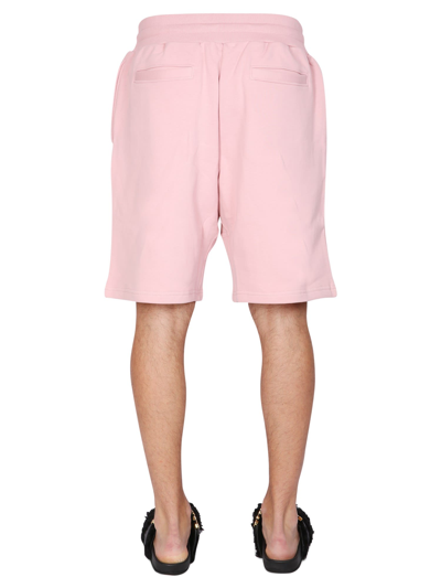 Shop Moschino Short With Logo In Rosa