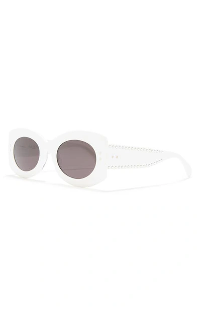 Shop Alaïa 51mm Oval Sunglasses In White White Grey