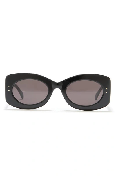 Shop Alaïa 51mm Oval Sunglasses In Black Black Grey