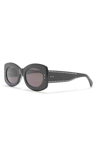 Shop Alaïa 51mm Oval Sunglasses In Black Black Grey