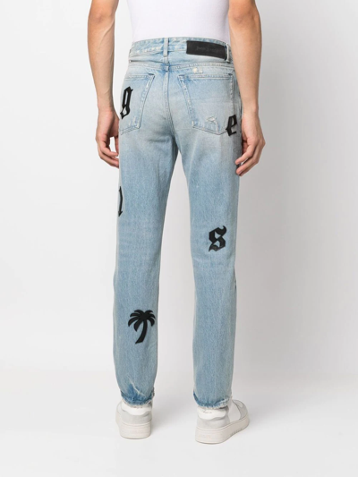 Shop Palm Angels Logo-patch Jeans In Blue