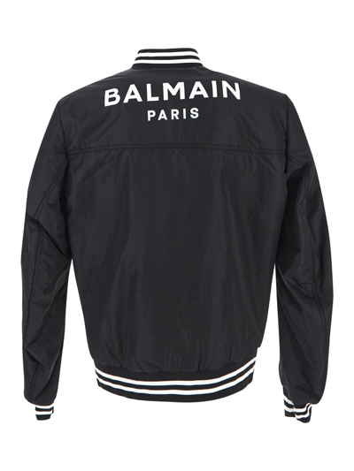 Shop Balmain Asymmetric Bomber Jacket In Black
