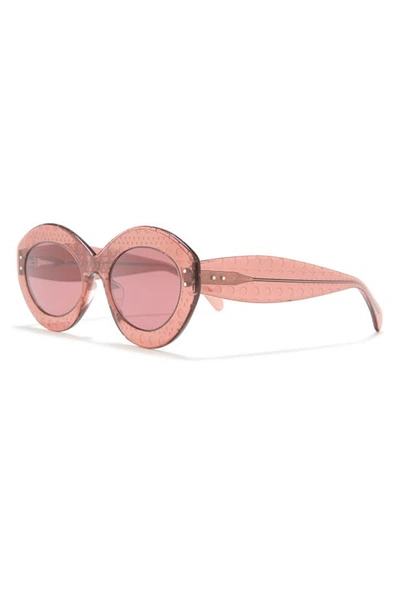 Shop Alaïa 52mm Round Sunglasses In Nude Red