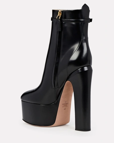 Shop Valentino Tan-go 155 Leather Platform Ankle Boots In Black