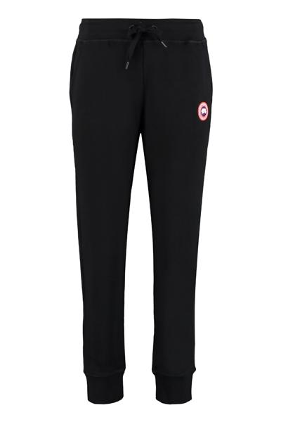 Shop Canada Goose Muskoka Logo Detail Cotton Track-pants In Black
