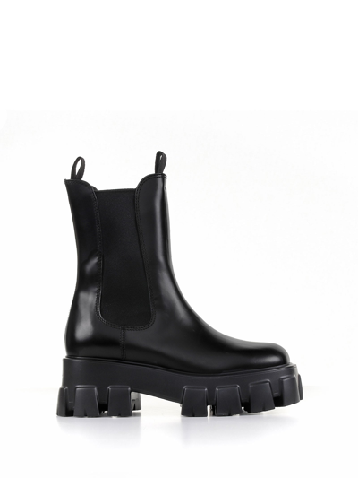 Shop Prada High Monolith Leather Ankle Boots In Black
