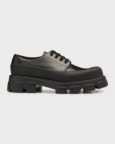 Shop Prada Men's Lug-sole Leather Derby Shoes In Nero