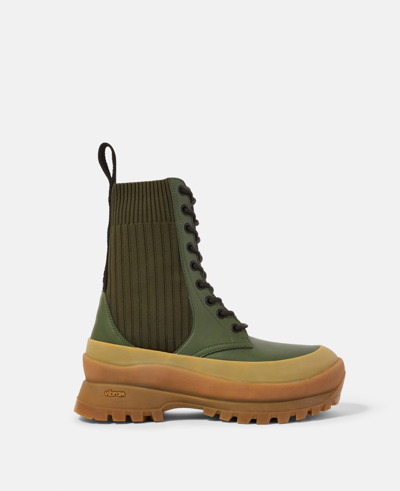 Shop Stella Mccartney Trace Knit Logo Boots In Military Green