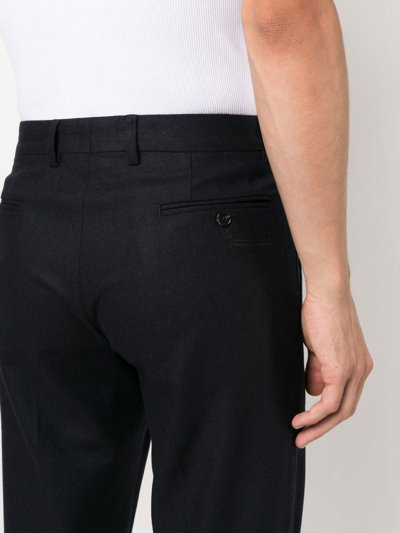 Shop Billionaire Slim-fit Wool Trousers In Black