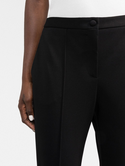 Shop There Was One Cropped Pressed-crease Trousers In Black