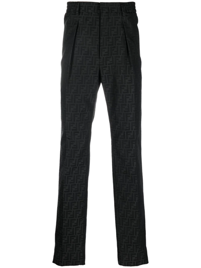 Shop Fendi Ff Pattern Tapered Trousers In Black