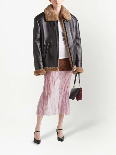 Shop Prada Oversized Shearling Jacket In Schwarz