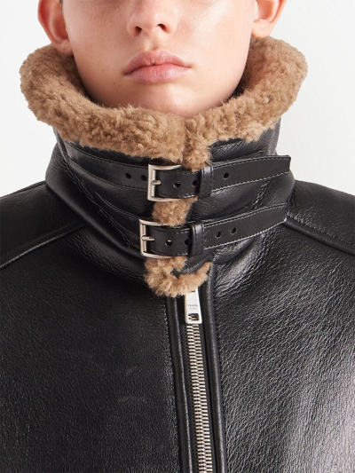 Shop Prada Oversized Shearling Jacket In Schwarz